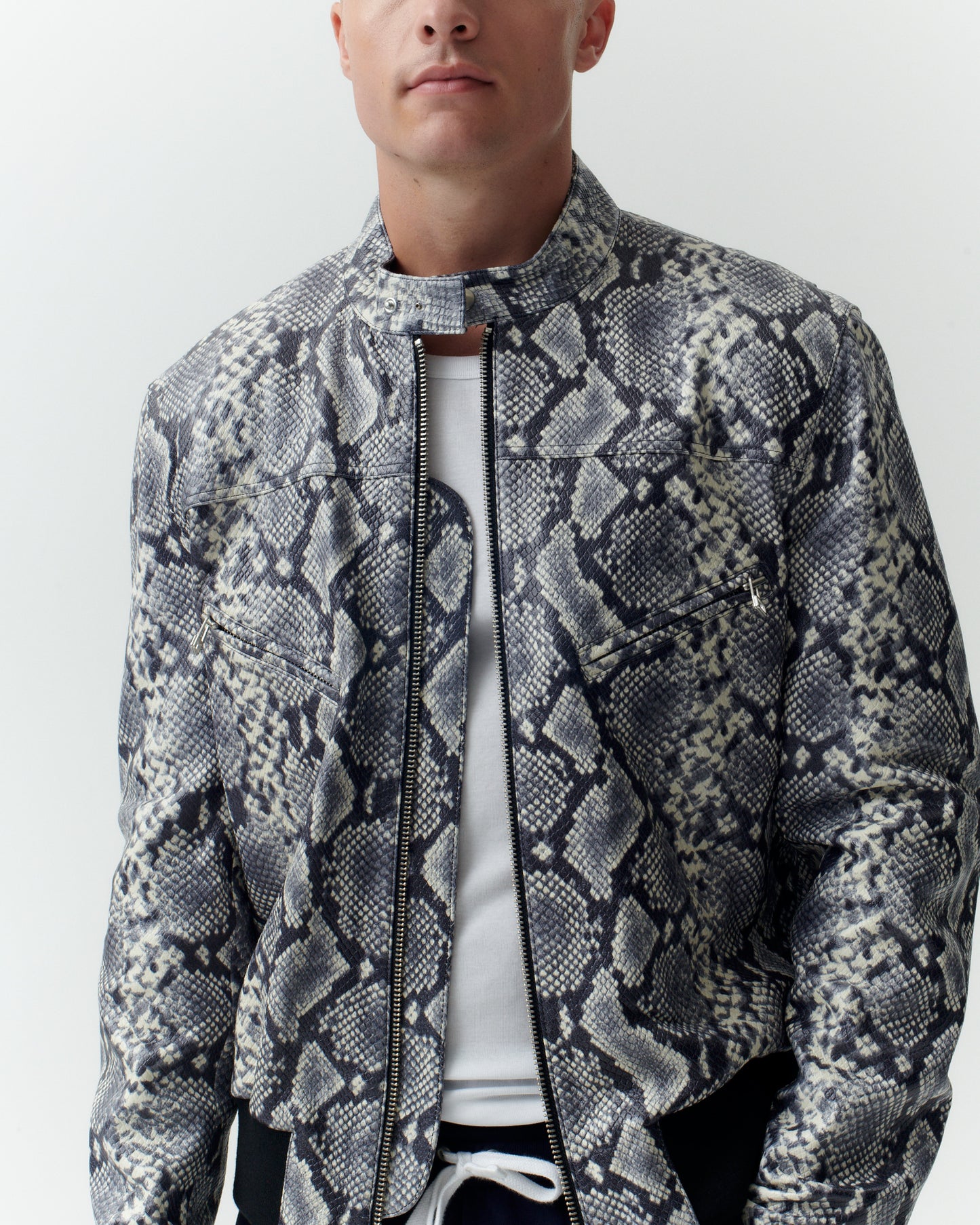 
                  
                    SNAKE PATTERN LEATHER JACKET
                  
                